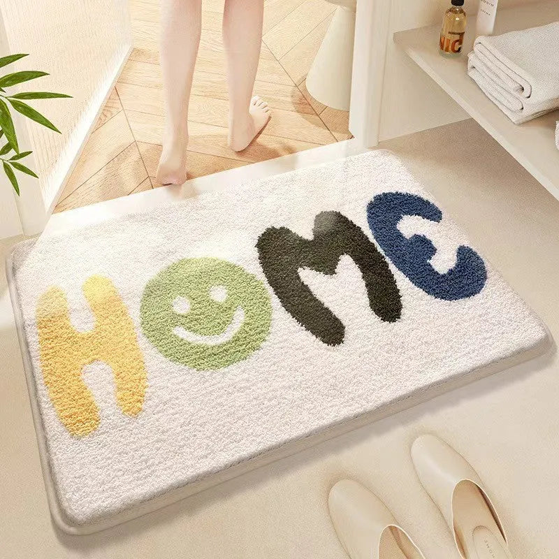 Square cashmere-style floor mat with rainbow pattern on Sky Sea background showing plastic dirt-resistant bottom