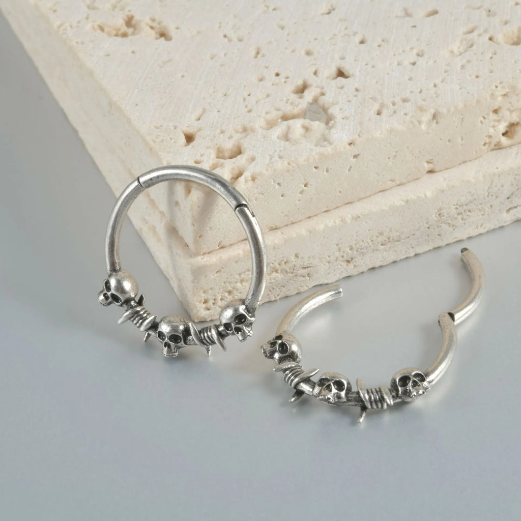 Antique silver and gold punk copper earrings with ghost head designs