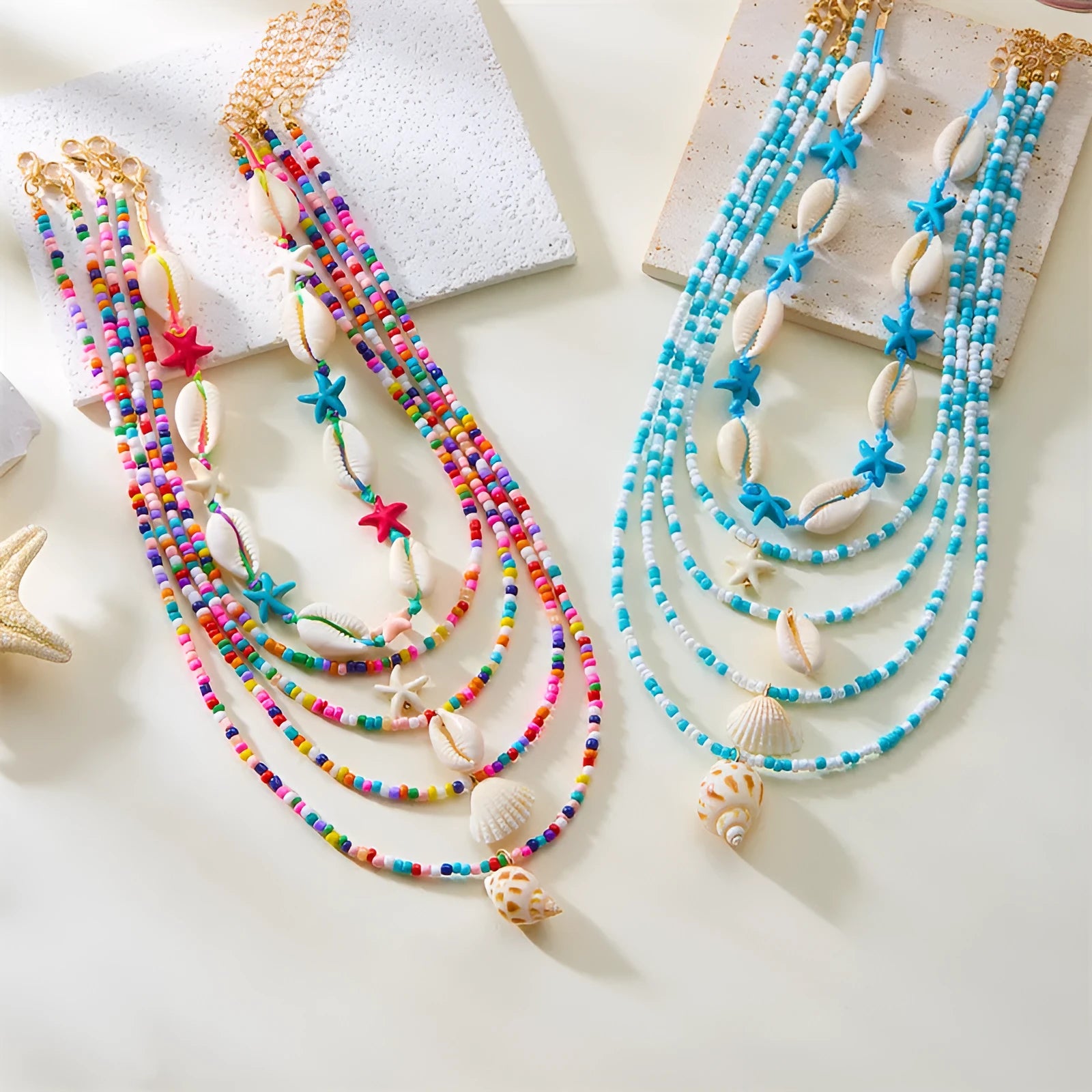 Five-piece women's necklace set with starfish shell and conch bead designs on electroplated alloy