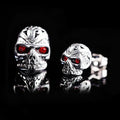Retro skull stud earrings with red eye ghost head design on alloy metal