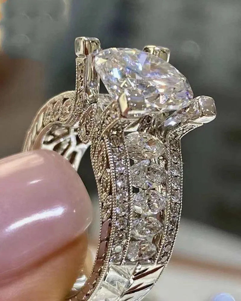 Alloy geometric women's ring with electroplated gold or white finish and round design elements