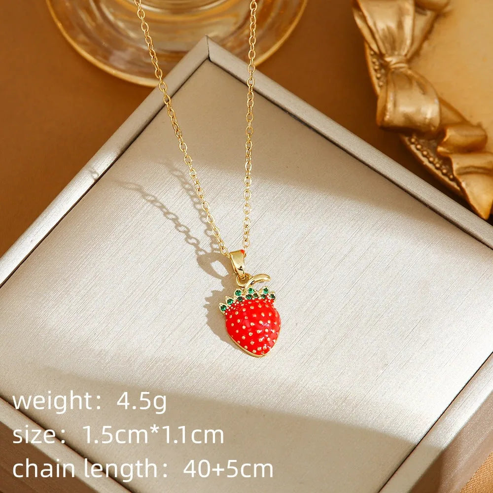 Titanium steel necklace with O-ring chain and delicate indie cherry pendant in golden finish