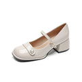 French style women's hiking shoes with chunky heel, square toe, and patent leather upper in apricot colour.