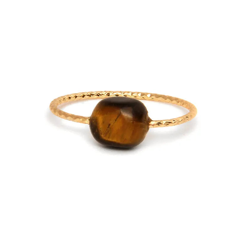 Geometric-shaped agate stone ring for women in various colour options on a neutral background.