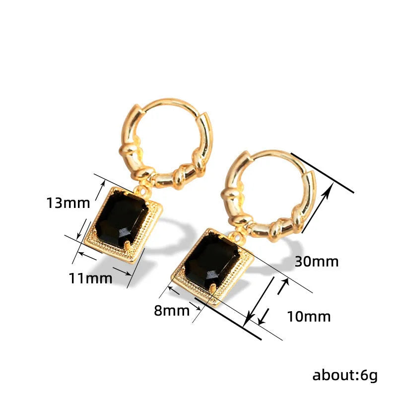 Geometric quadrilateral copper earrings with black zirconia centrepiece in French Court Retro style for women.