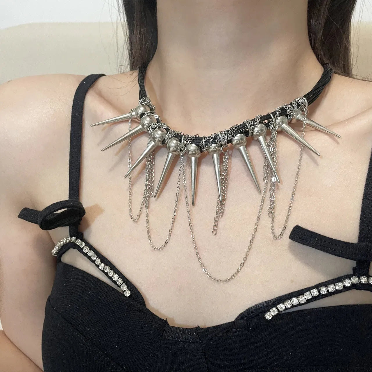 Round beads winding tassel necklace with leather fringe and metal rivet embellishments in picture colour.