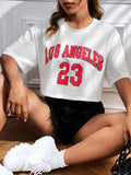 Black cotton t-shirt with white English letter printing, loose fit with exposed navel design