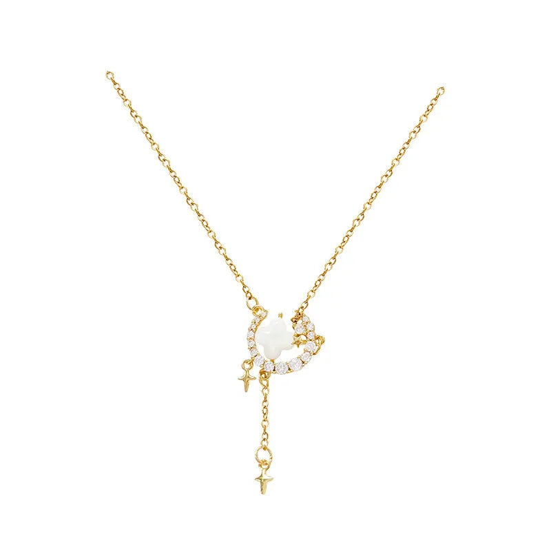 Gold or silver women's necklace with star moon pendant and sparking stones on a copper chain.