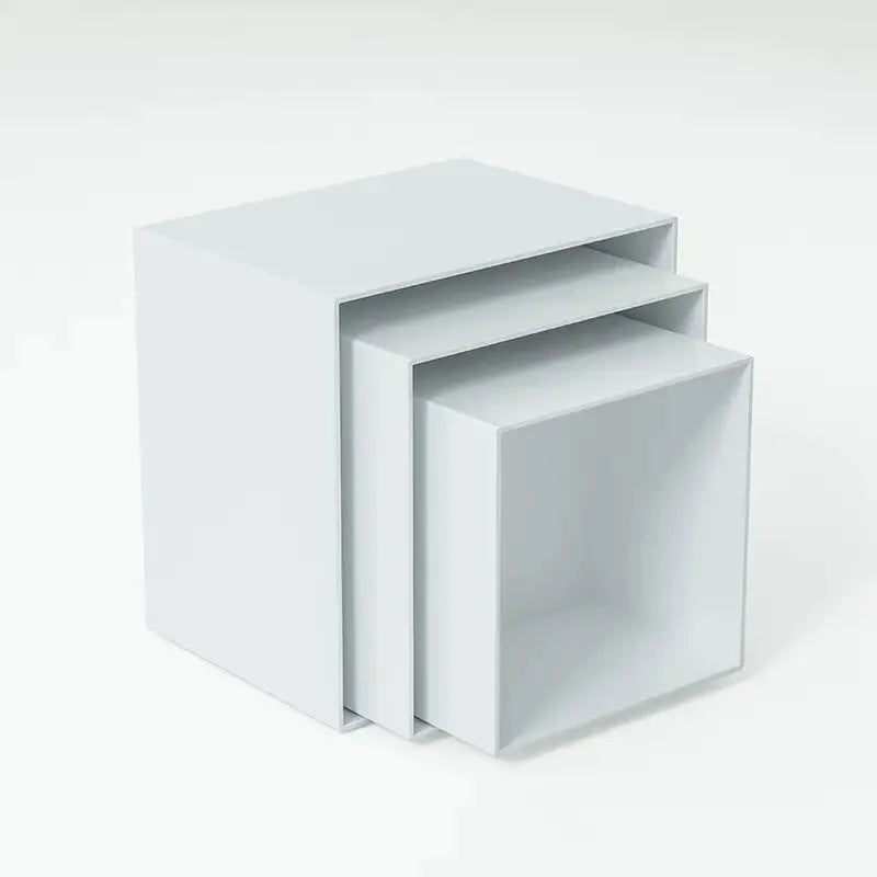 White plastic cube dessert display stand with stackable units for tiered cake and pastry presentation