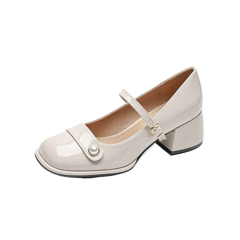 French style women's hiking shoes with chunky heel, square toe, and patent leather upper in apricot colour.