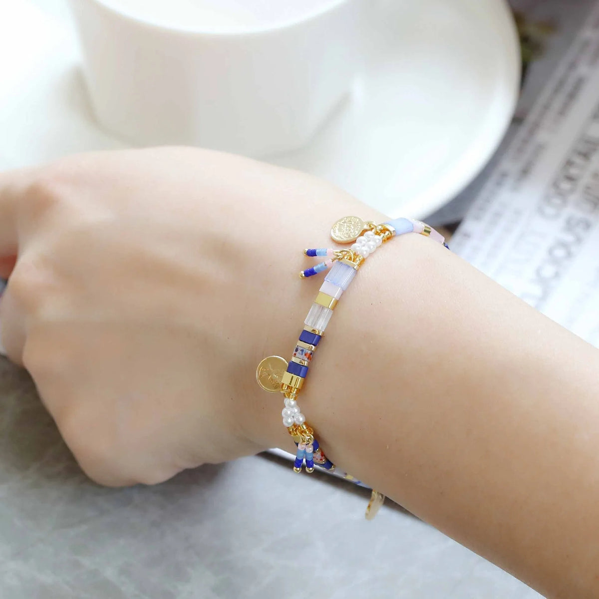 Women's handmade imitation pearl bracelet with glass coloured beads in original design