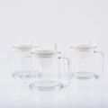 Transparent spill-proof drinking cup with lid on white background