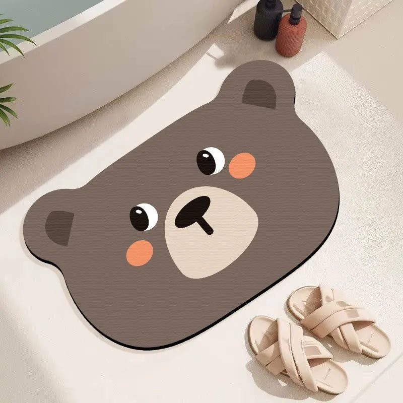 Cartoon animal design diatom oil bathroom mat in alien shape on bathroom floor.