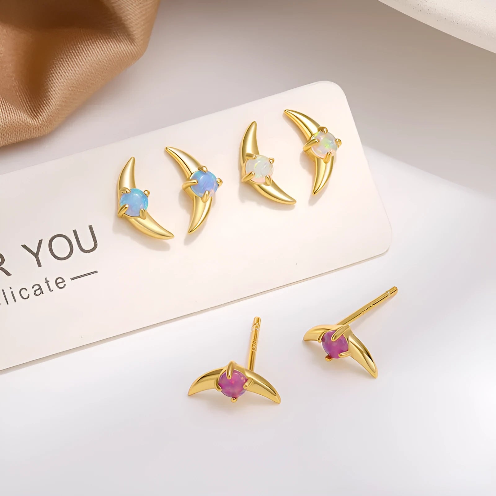 925 sterling silver geometric earrings with electroplated finish and stone accents in platinum or gold colour