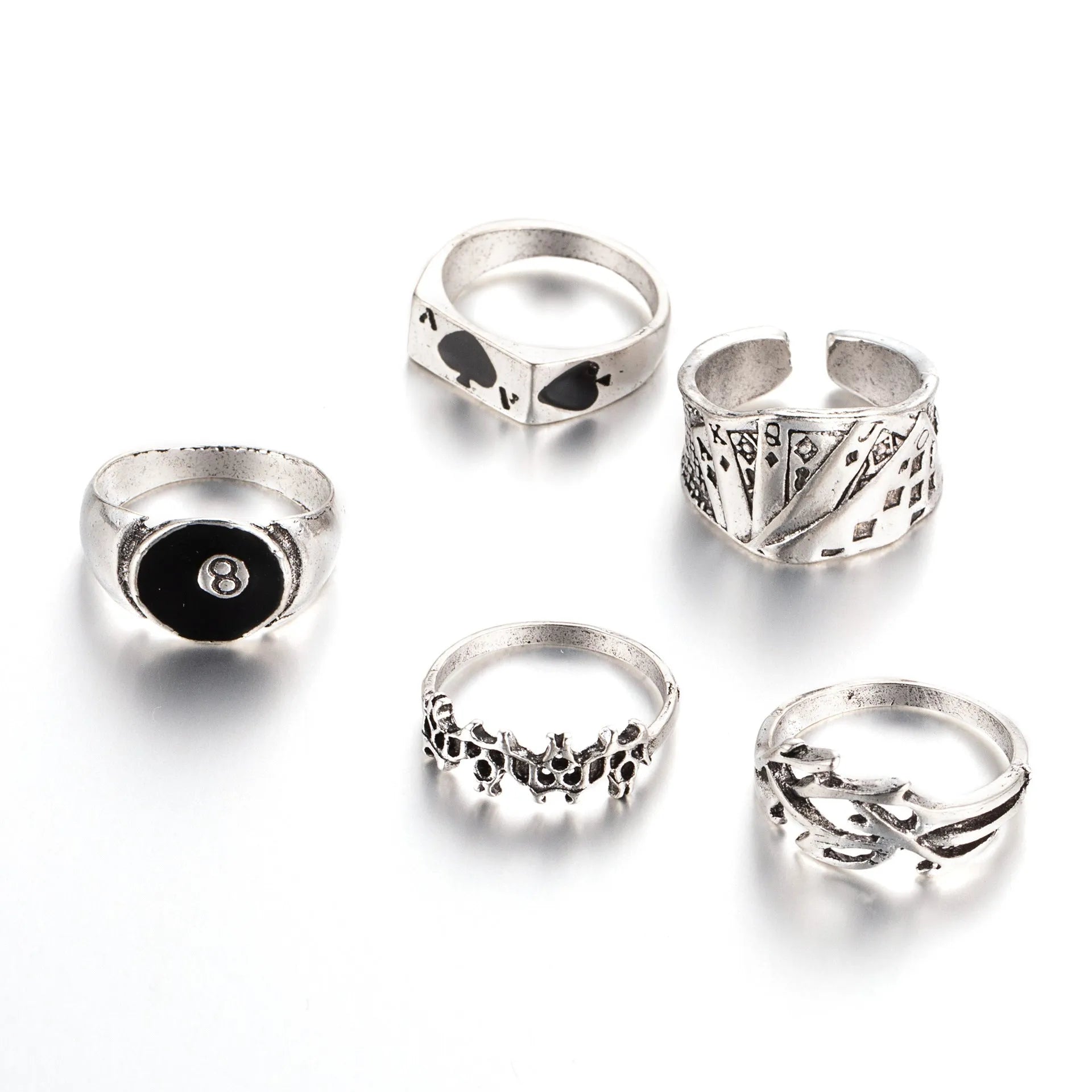 Black alloy adjustable ring with a raised retro spade card symbol design.