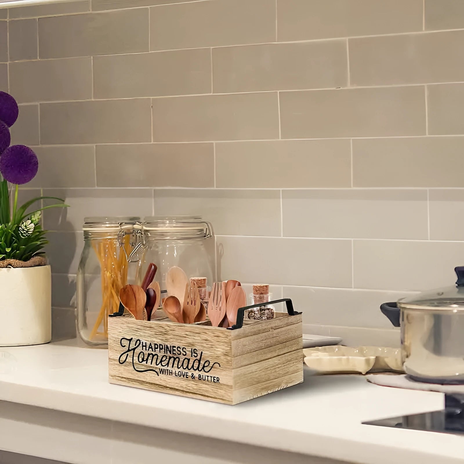Wooden kitchen storage box with internal grid dividers for organising cutlery and utensils.