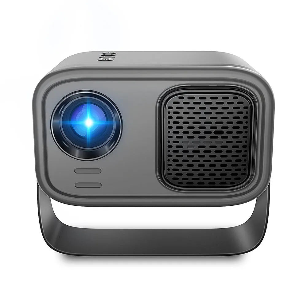Black portable smart projector with remote control on table