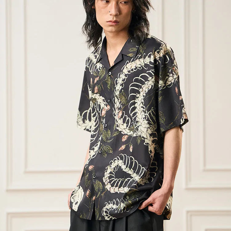 Original snake bone and flower pattern printed on a loose-fit, short sleeve Cuban collar shirt in various colours.