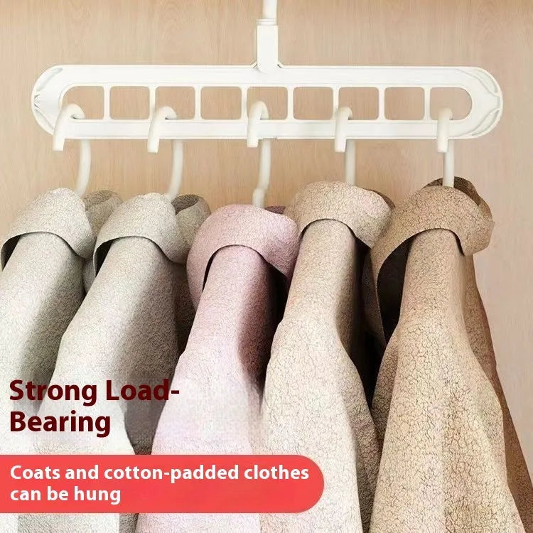 Multifunctional plastic hanger with nine holes for trousers, shown in folded position for space saving