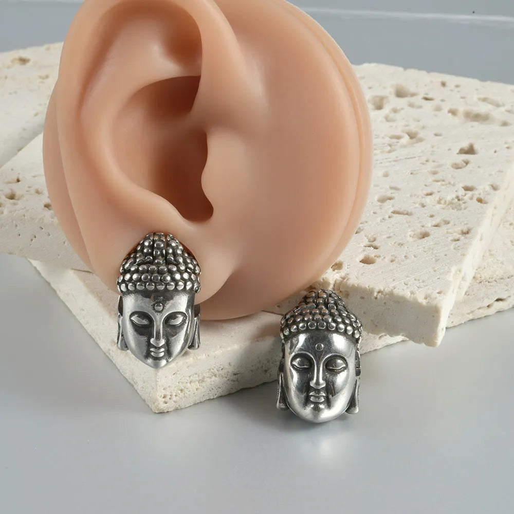 Stainless steel hollow skull Buddha earrings with electroplated finish in gold, black, steel or Buddha head colours