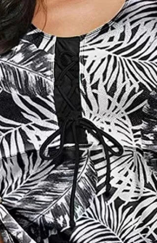 Women's split bow bikini swimsuit in a colour pattern, showing the two-piece design and bow detail.