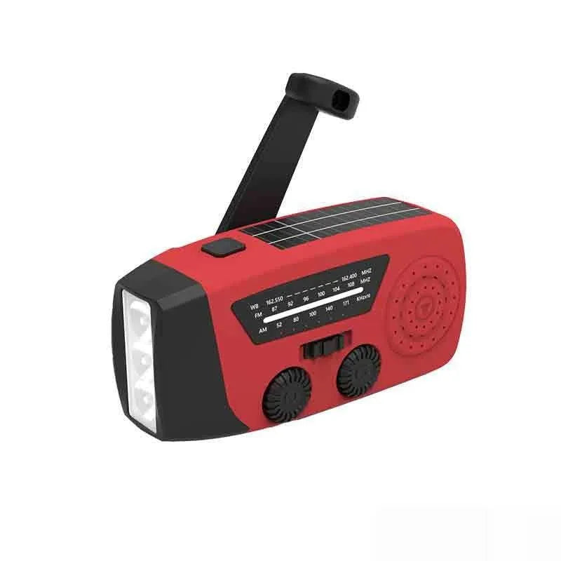 Red rechargeable emergency hand radio with torch, built-in speaker, wrist strap, and Type-C charging cable.