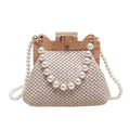 Women's horizontal square straw shoulder bag with pearl chain strap, shown in beige colour with visible sewing line detail.