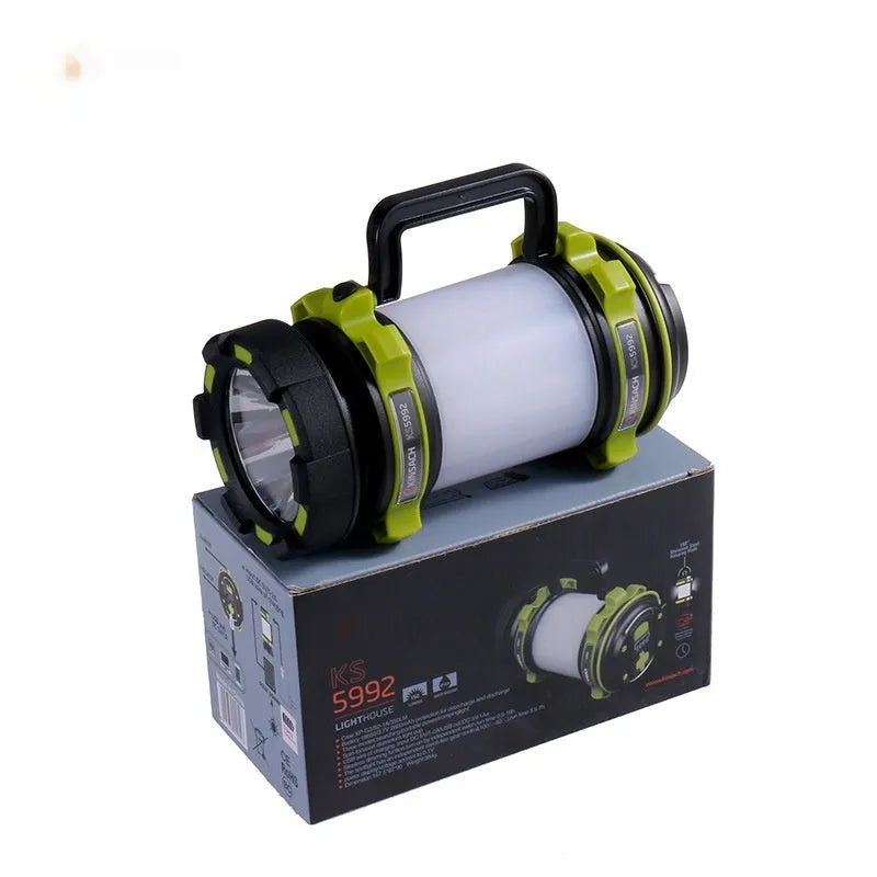 Green KS-5992AC portable LED searchlight with 5W headlight and 3W side light on outdoor background
