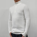 A man's grey half turtleneck zip sweater made from a cotton blend fabric, shown on a hanger.