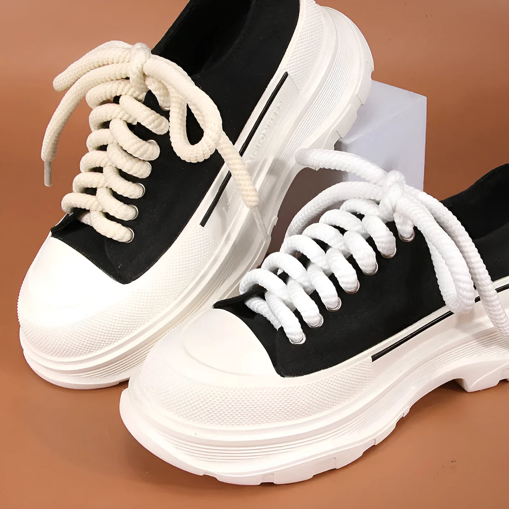 Solid colour round woven shoelaces for bread shoes in white, beige, and black.