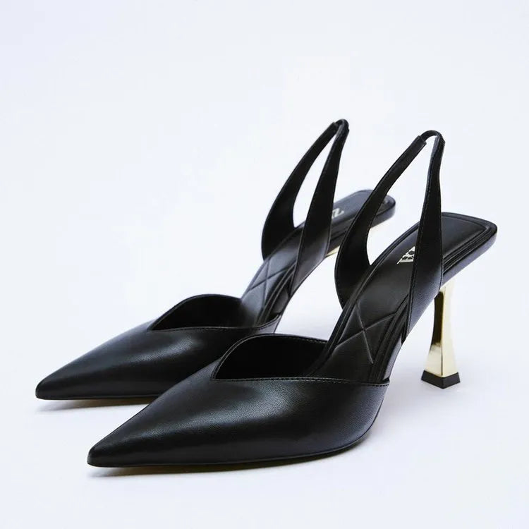 Apricot and black women's pointed toe high heels with patent leather upper and shallow mouth.