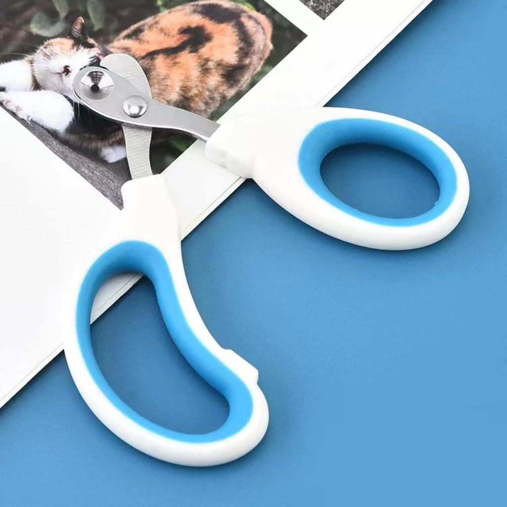 Blue cat nail clippers with circular cut hole design and cushioned handle for safe pet nail trimming