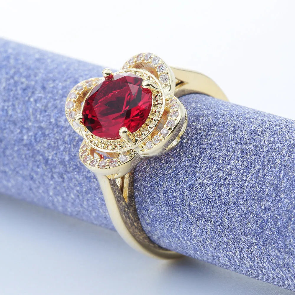 Copper ring with zircon stone inlaid in a fruit-shaped design.