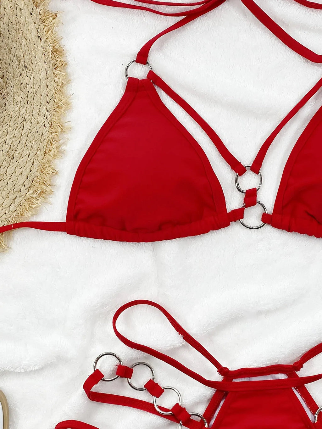Women's separated nylon bikini set in red, including a bikini top and matching shorts.