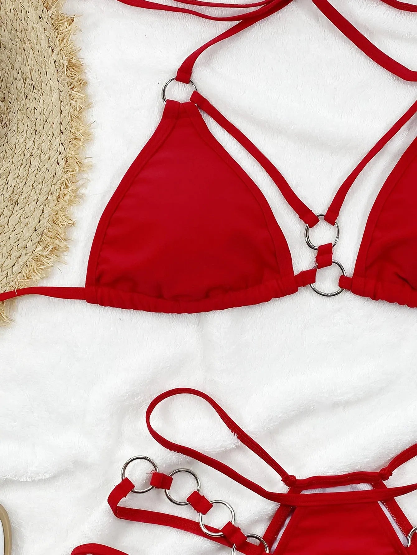 Women's separated nylon bikini set in red, including a bikini top and matching shorts.