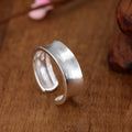 Geometric adjustable opening sterling silver ring with frosted finish and electroplated silver colour