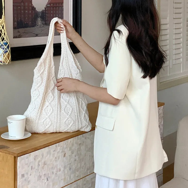 Women's retro knitted wool shoulder tote bag in a solid colour with double straps, shown with a 55cm width.