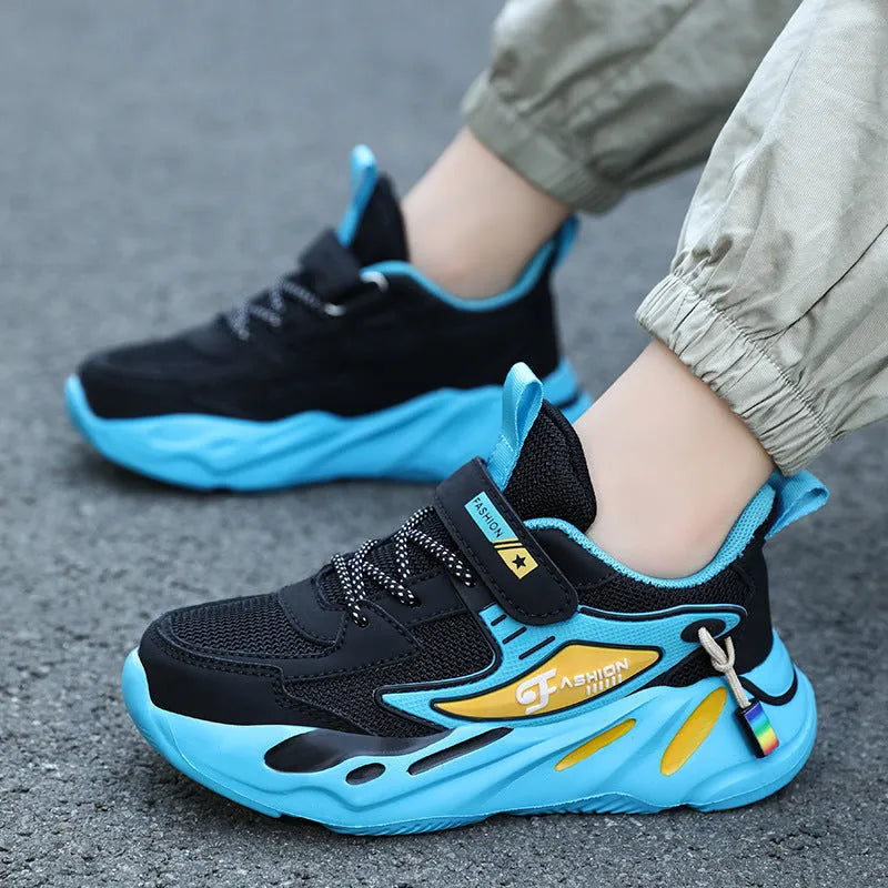 Boys' dark blue and light blue sports running shoes with Velcro strap and mesh upper.
