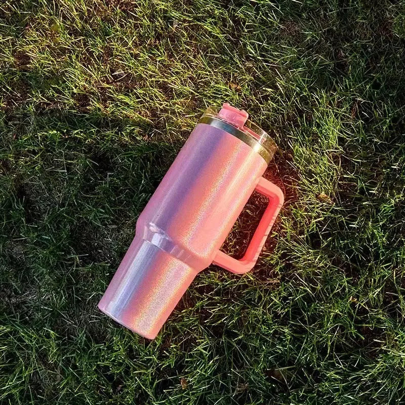 Large stainless steel vacuum insulation cup in a rainbow or gradient colour finish.