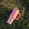 Large stainless steel vacuum insulation cup in a rainbow or gradient colour finish.