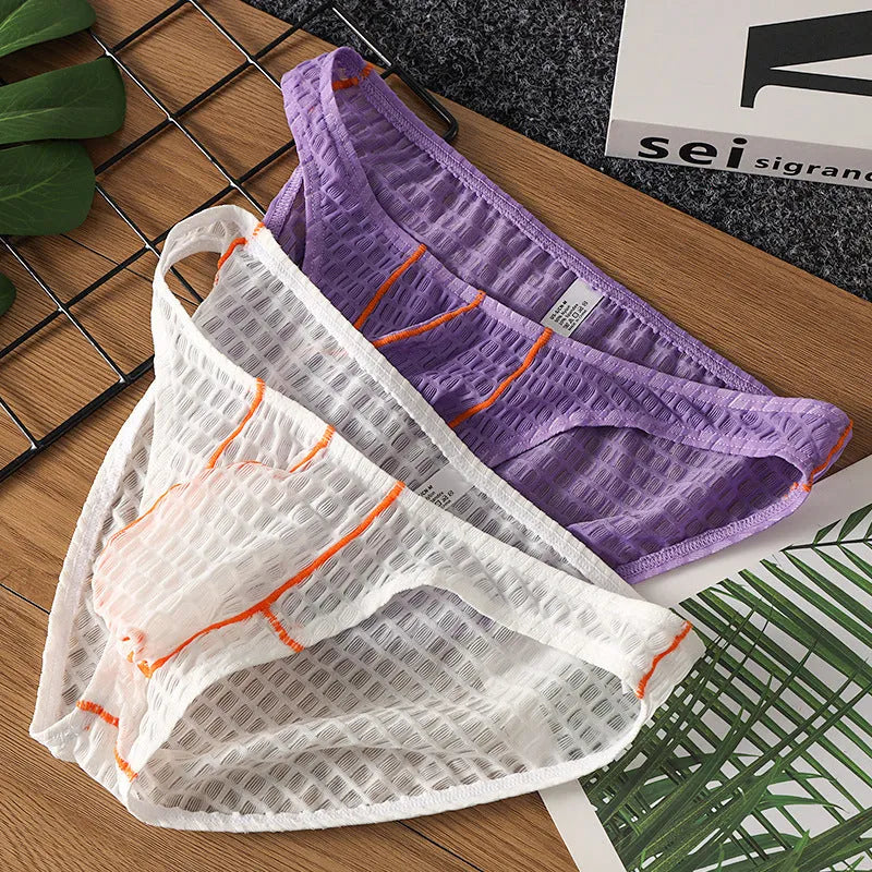 Men's solid colour ice silk lace low waist briefs for sports in white, black, green, rose red, and light purple.