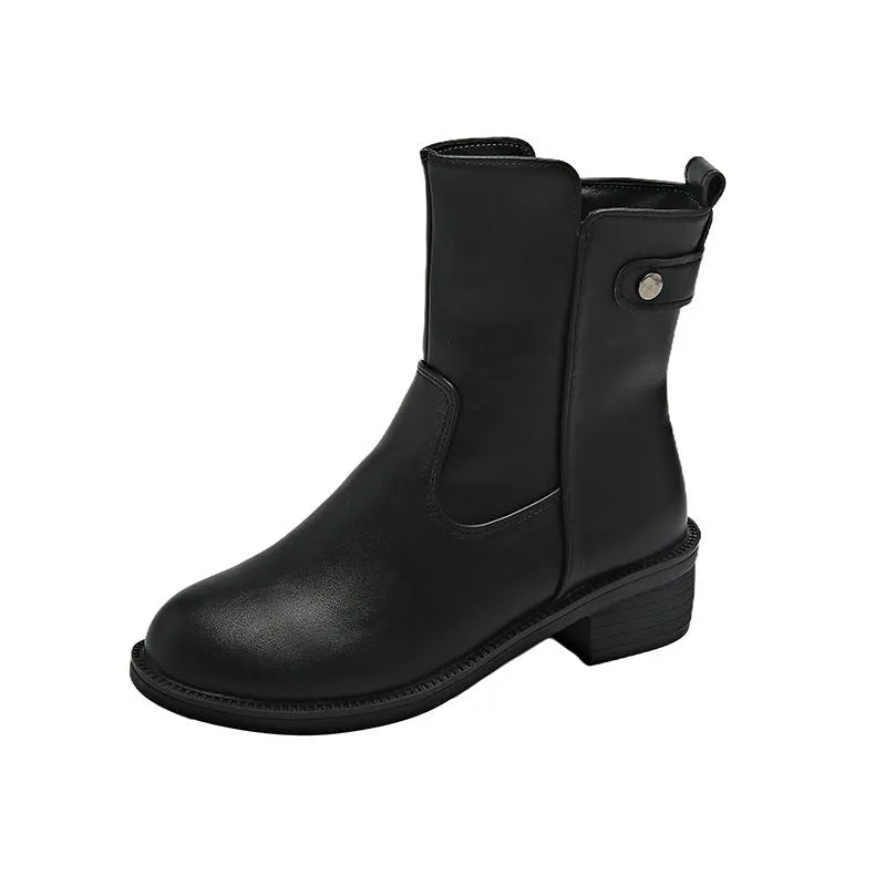 Black women's low heel ankle boots with a side zip and round toe on a rubber sole.