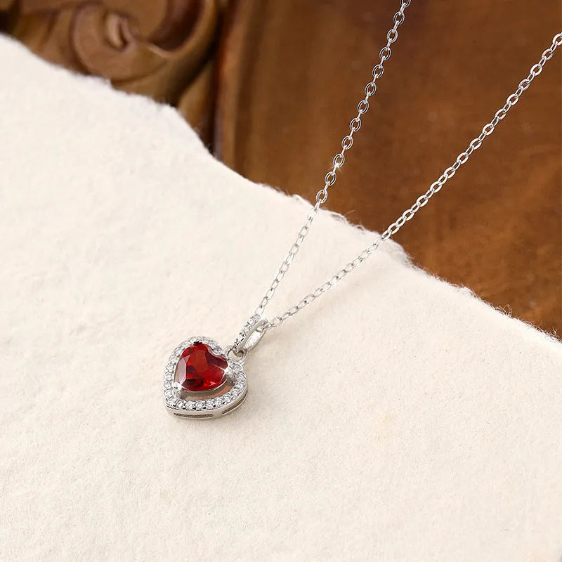 Women's sterling silver heart pendant necklace with natural gemstone on cross chain
