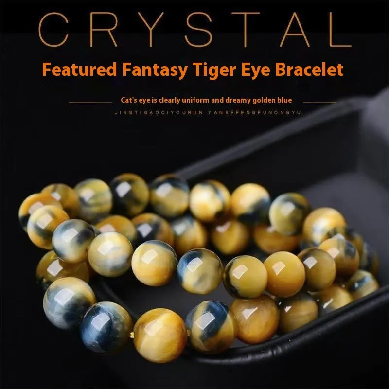 Handmade Fantasy Tigereye agate gemstone bracelet with round beads on a wrist.