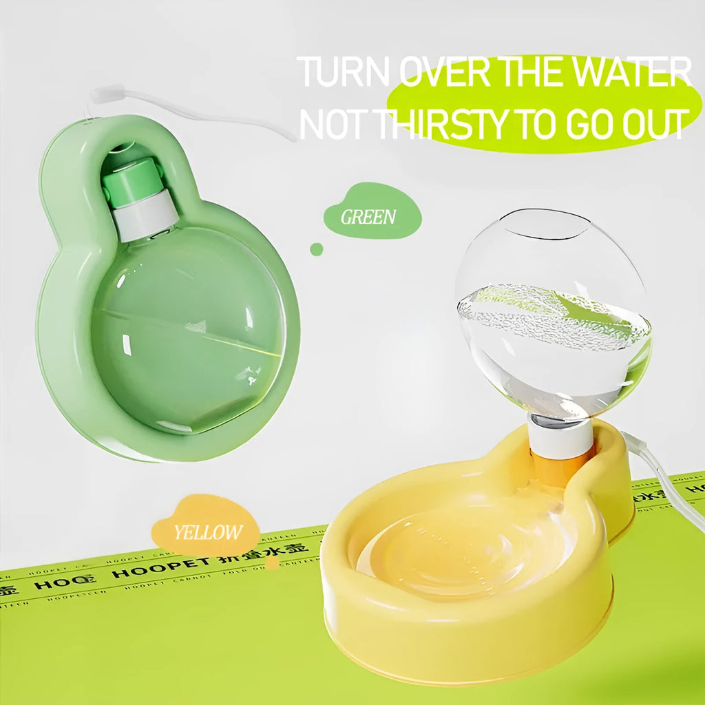Green portable pet travel cup with handle, showing pull-out drinking bowl for dogs.