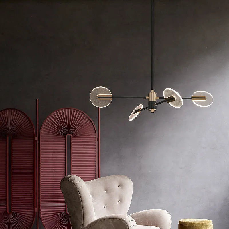 Nordic style iron frame LED chandelier with multiple heads and acrylic diffuser shades.