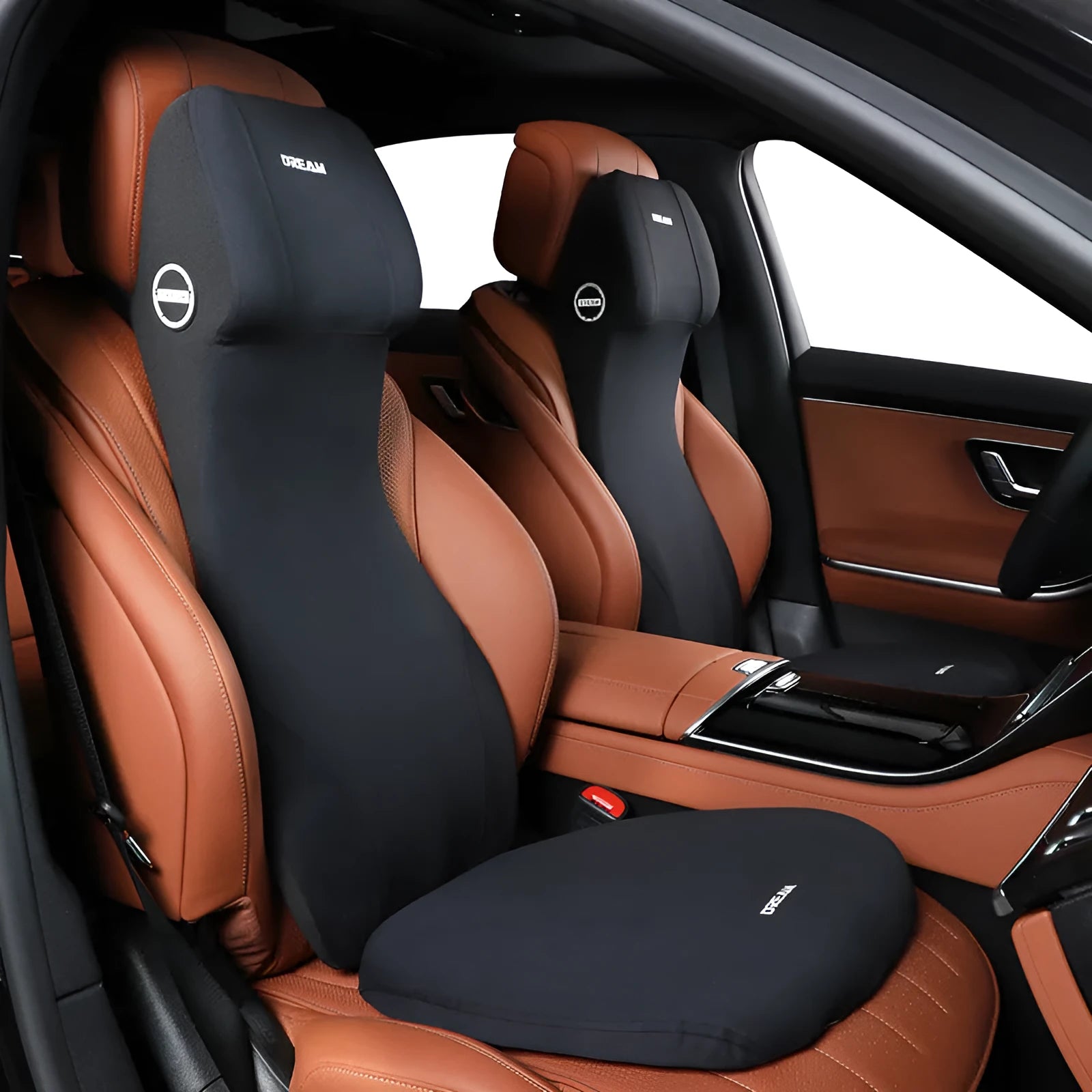 Black memory foam automotive lumbar support cushion with integrated headrest on a car seat.