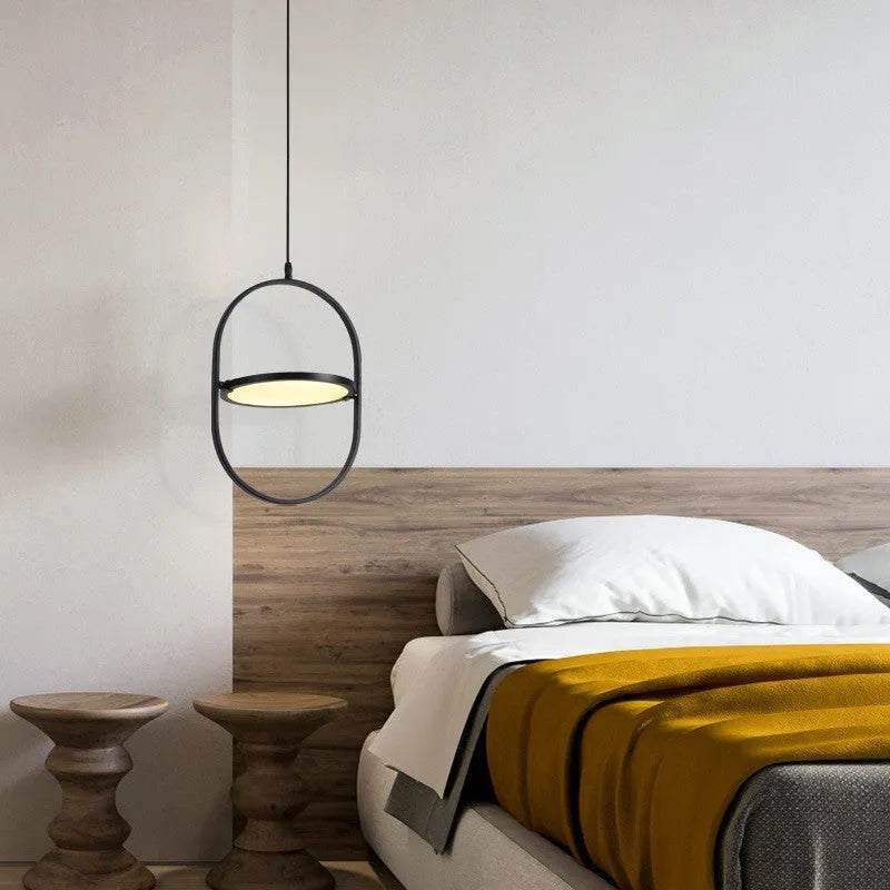 Nordic bedside lamp with reversible magic eye and integrated power strip in black horizontal style