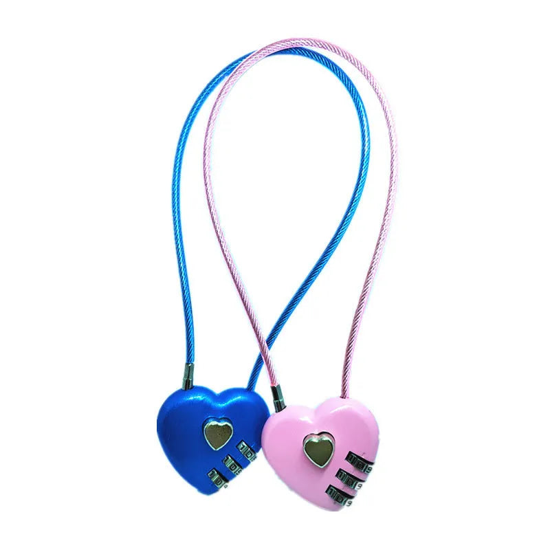 Heart-shaped wire rope lock in various colours with a steel cable, shown securing a bicycle helmet.