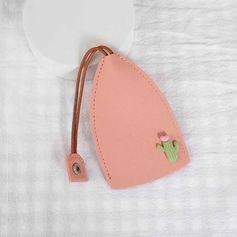 Cartoon pull-out car key case in PU leather with various design options including cactus, rabbit, and fruit themes